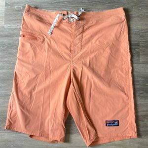 Patagonia stretch wavefarer in coral Size 33 excellent condition - out grown.
